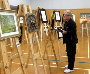 Ron Esplin judging the entries